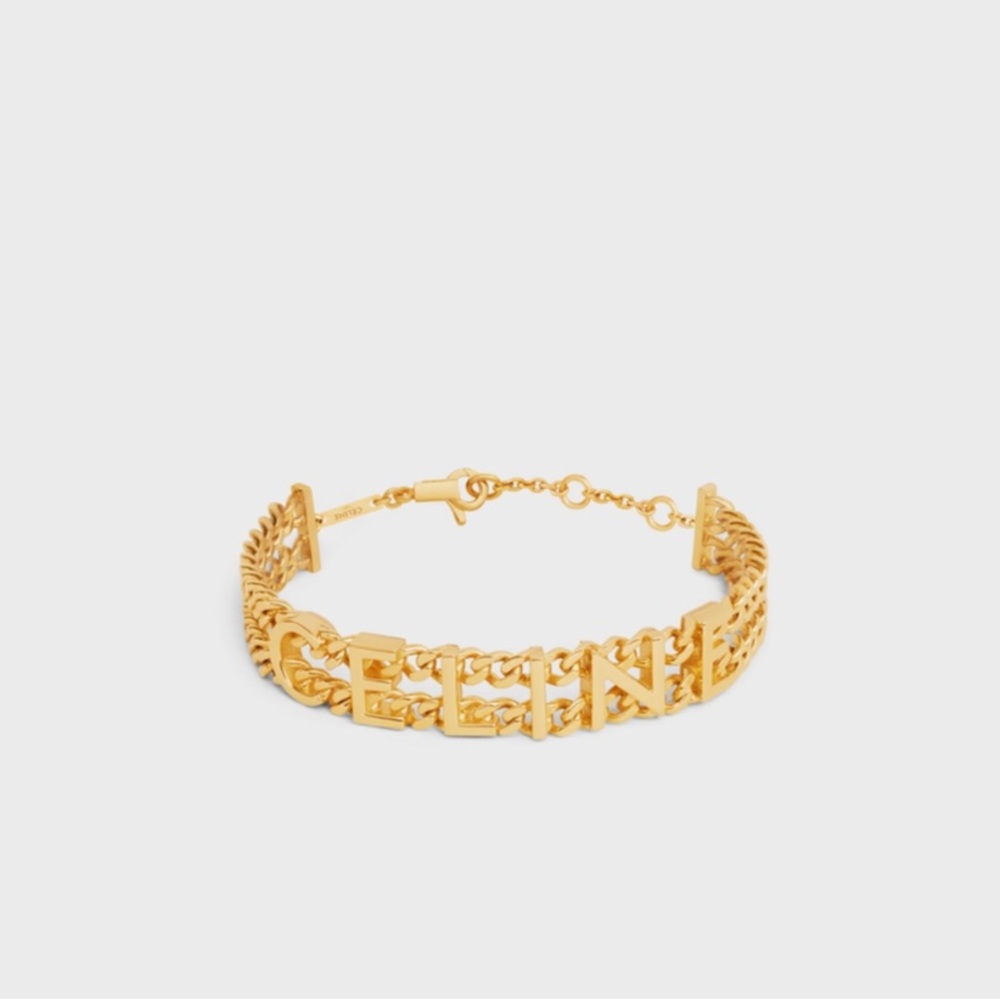 Celine Gourmette bracelet in brass with gold. One size.